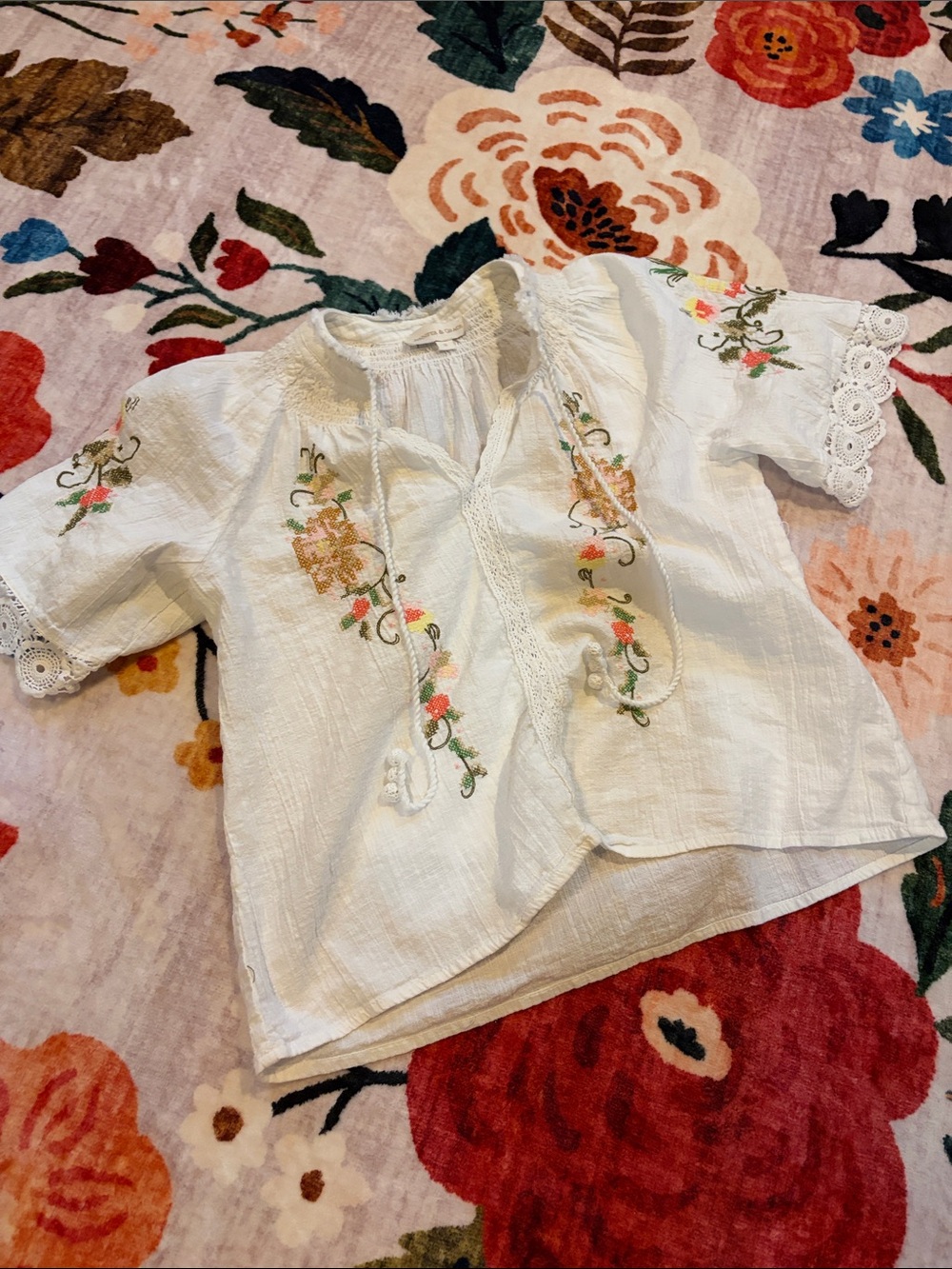White Embroidered Peasant Blouse with Floral Accents